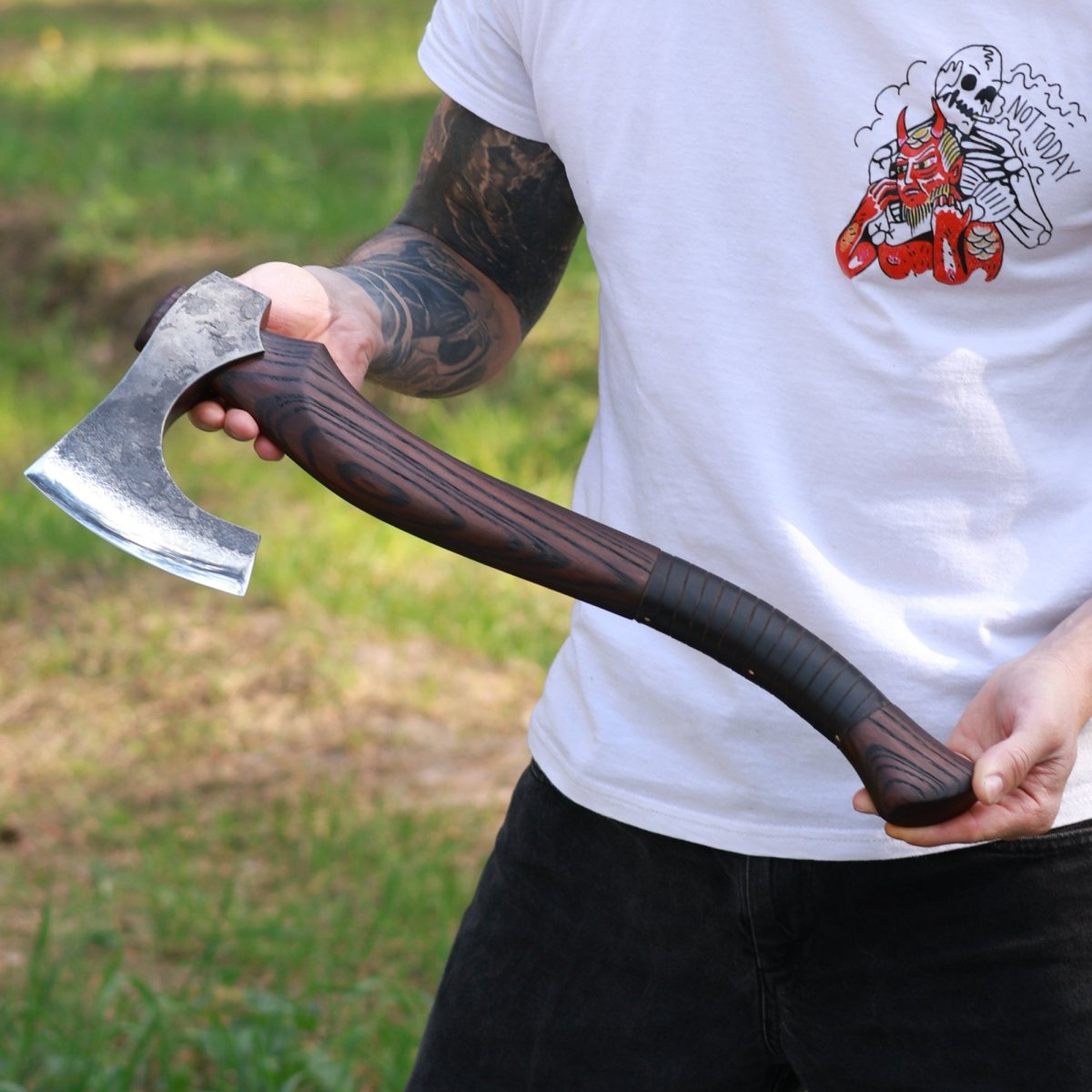 Hand forged Viking axe "Svart barbar" with carved handle