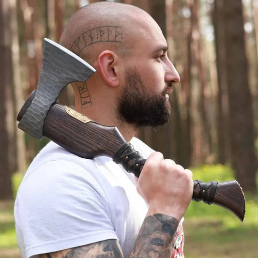 Hand Forged Viking Axe "Veles" with leather wrap on the handle